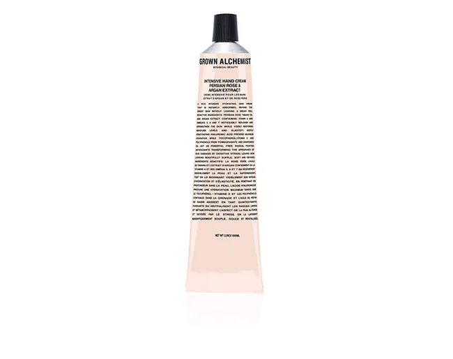 Grown Alchemist Intensive Hand Cream tube with text detailing ingredients and features on the front.