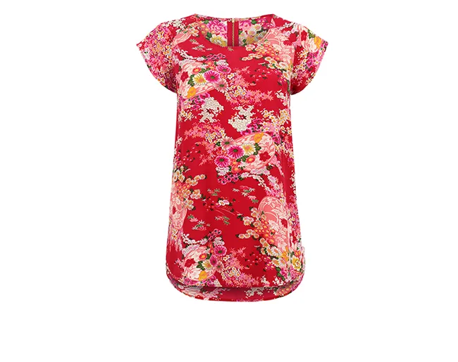 Red floral short-sleeve tunic with vibrant pink, orange, and white blossoms on a white background.