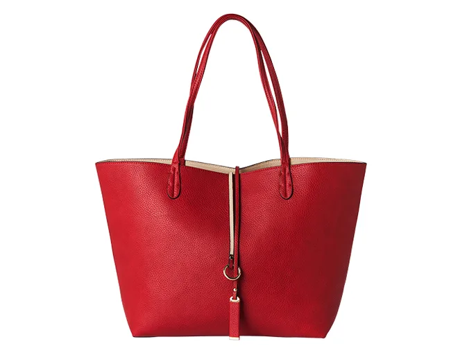 Red leather tote bag with long handles and gold zipper detail on a white background.