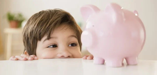 Boy with piggy bank