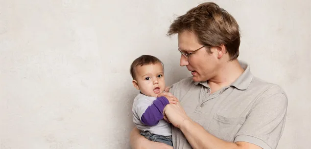 How fatherhood affects men - father and son cuddle