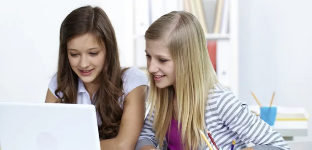 Daughter being led astray by friends - two teenage girls on a laptop