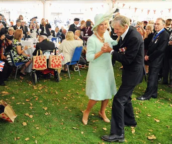 Camilla charms at a reception for VJ Day celebrations, showing the public the woman who stole Charles’ heart. 