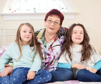 Marina Charlton with her girls, Olivia (left) and Ella (right)
