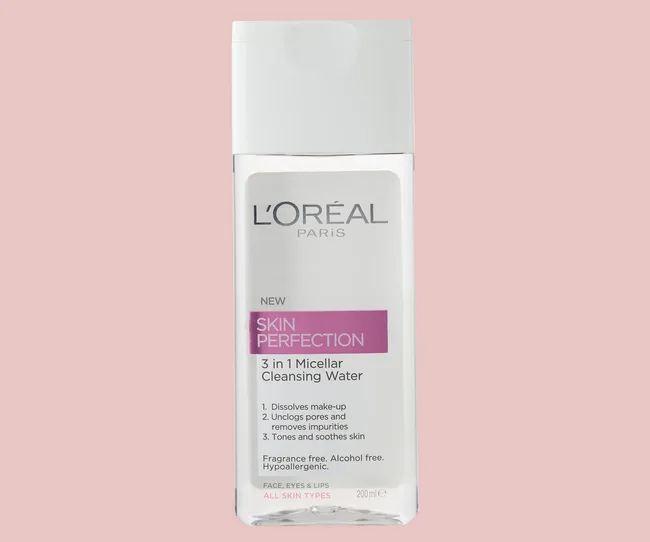 L'Oreal Paris Skin Perfection 3-in-1 Micellar Cleansing Water bottle, 200ml, on a pale pink background.