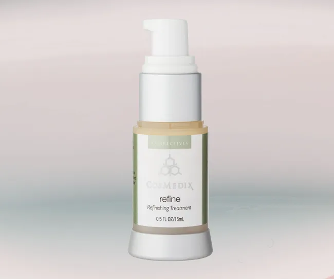 CosMedix Refine Refinishing Treatment bottle on a gradient background.