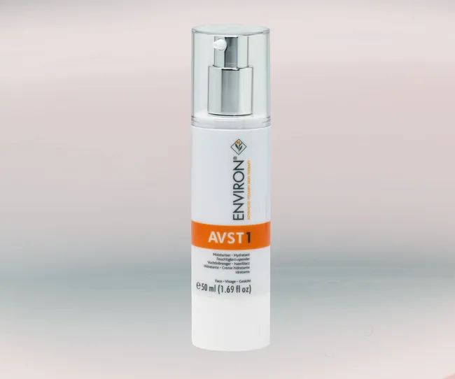 Environ AVST1 moisturizer in a white pump bottle with orange label, 50ml size.