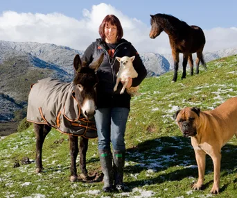 Carolyn Press-McKenzie at Kaitoke with some of her rescue animals