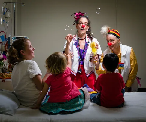 Clown doctors cheering up the kids in Auckland's Starship Children's hospital