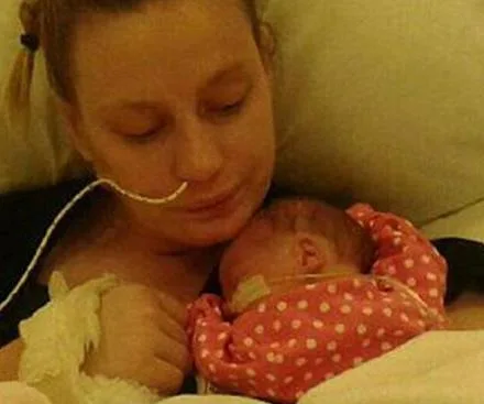 Mother wakes from coma to discover she has a seven-week-old baby girl