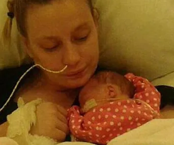 Mother wakes from coma to discover she has a seven-week-old baby girl