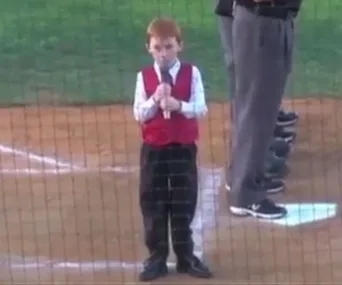 Little boy fights hiccups to sing Australian anthem