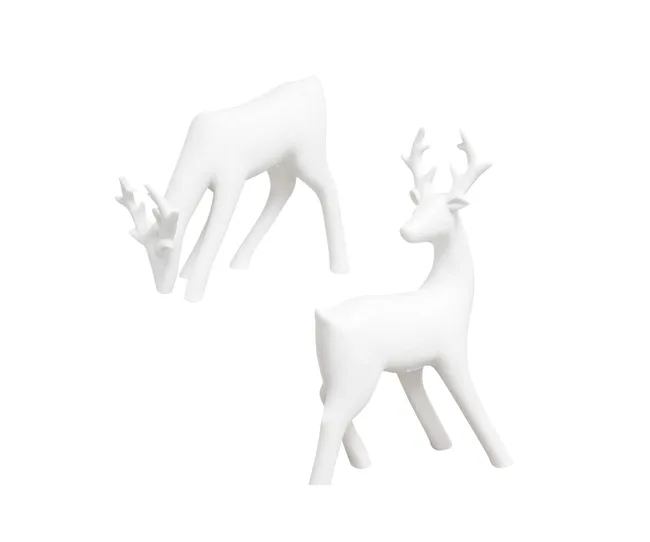 Two minimalistic white deer figurines, one standing, one grazing.