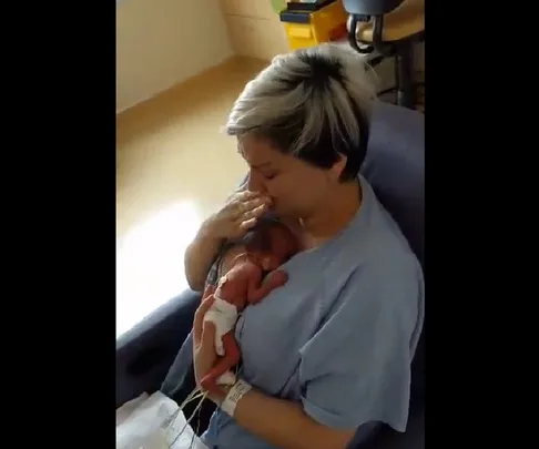 Mum meets new baby