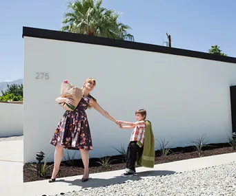 Mum dragging kid