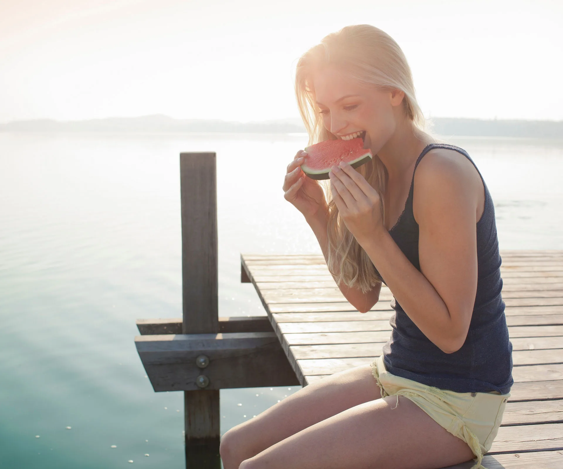 Woman eating watermelon