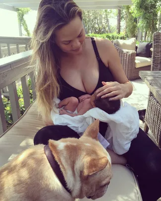 Chrissy Teigen with new daughter Luna