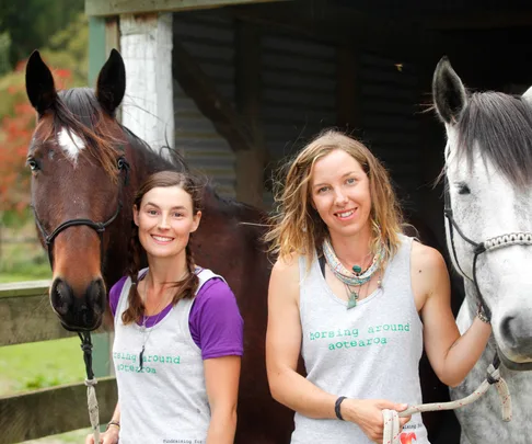 Kendall (far left) and Larissa with their trusty steeds China and Sprite.