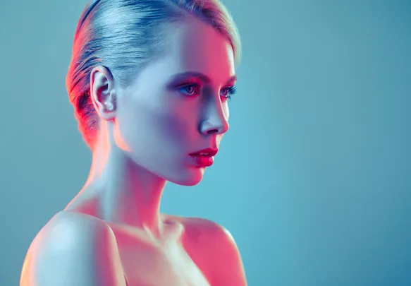 A brunette woman smiling at the camera