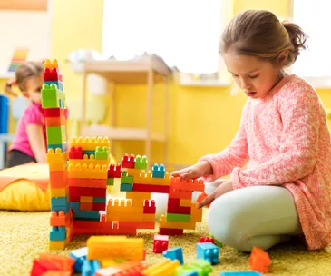 Girl playing with blocks