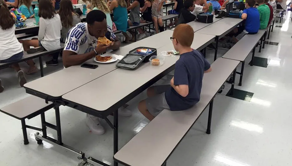Football player befriends autistic boy