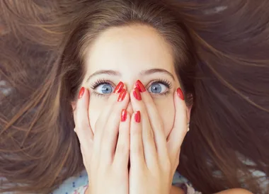 Woman looking embarassed
