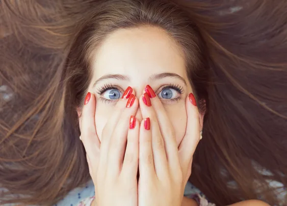 Woman looking embarassed