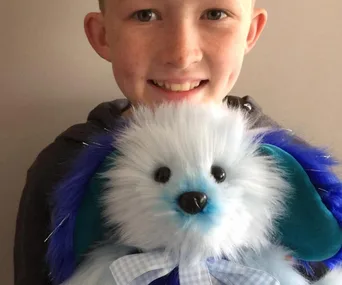 Little boy makes toys