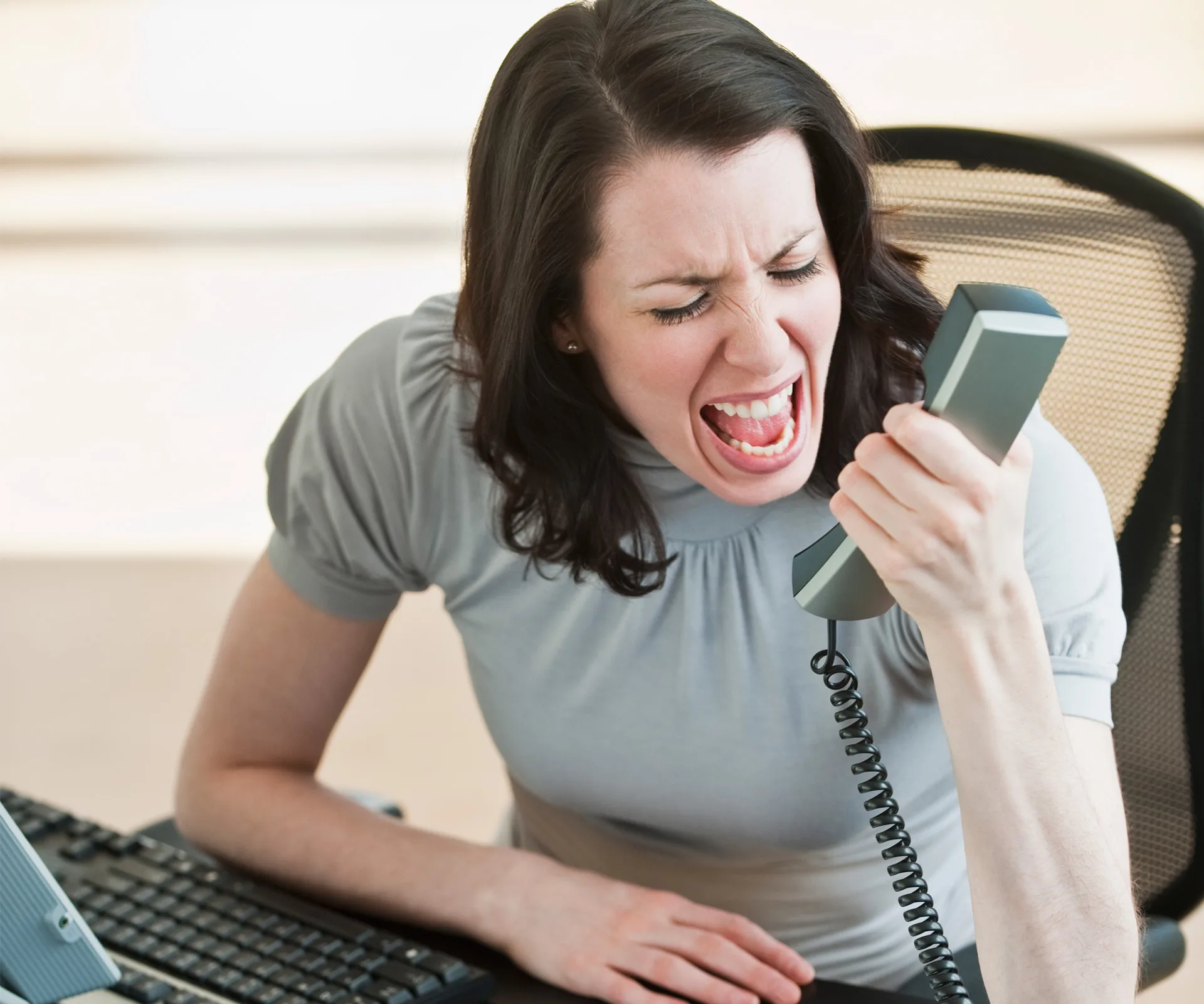 A woman on the phone reporting mansplaining