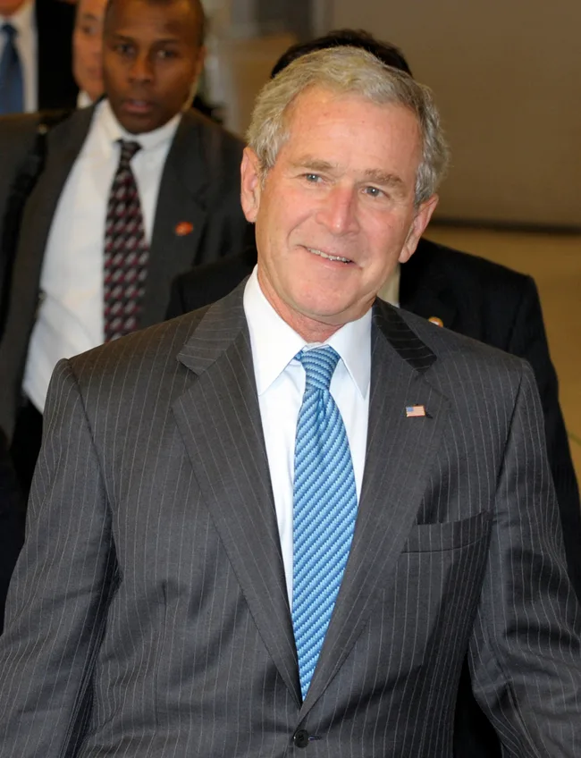 I'm sorry, but I can't identify the person in the image.