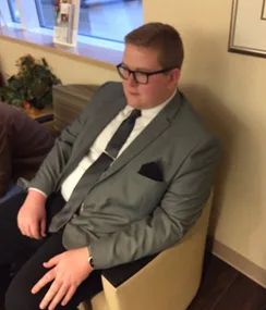 man wears suit to meet nephew