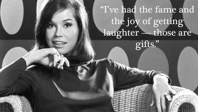 Black-and-white portrait of a woman sitting on a chair with a quote about fame and laughter.