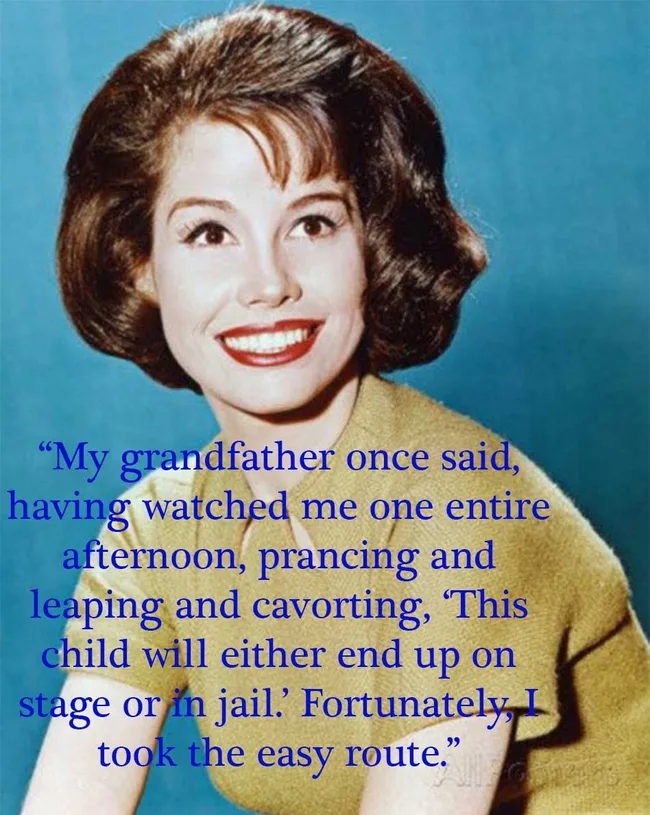 A woman with short hair smiles against a blue background, with text overlay of a quote about prancing and choosing an easy route.