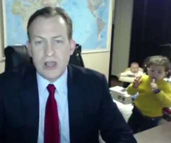 Robert E Kelly and his children during a BBC interview