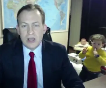 Robert E Kelly and his children during a BBC interview