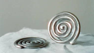 Sophie Lou Jacobsen Etagere Spiral set of eight nickel-plated coasters