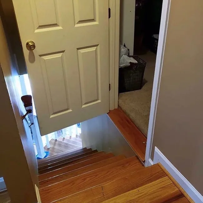 A door that opens halfway down a staircase