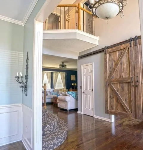 A home with a barn door that doesn't reach the floor