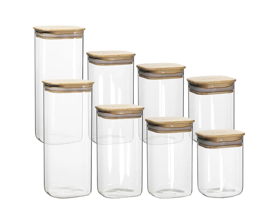 A set of 8 glass and timber canisters