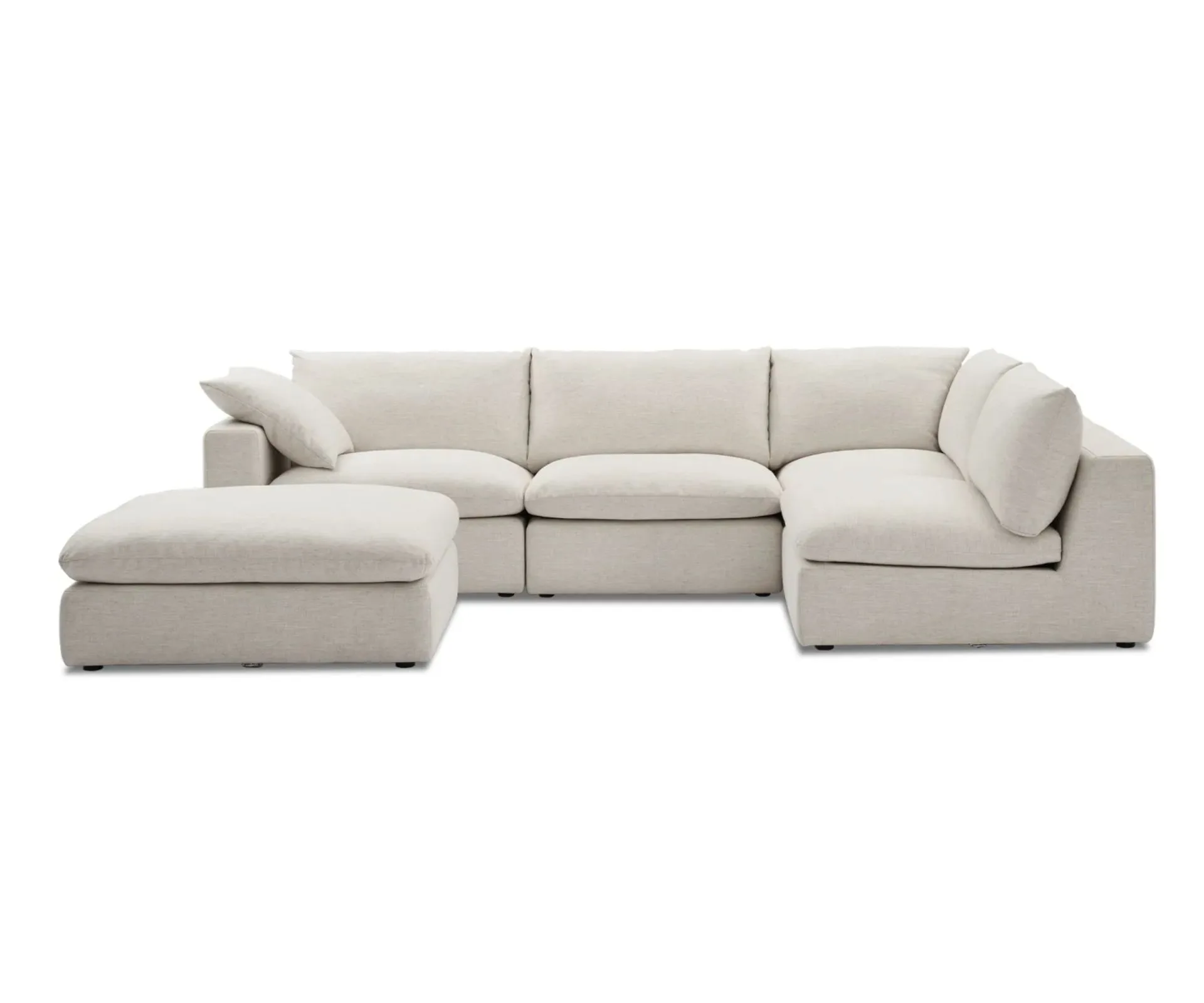 White chaise sectional sofa with ottoman