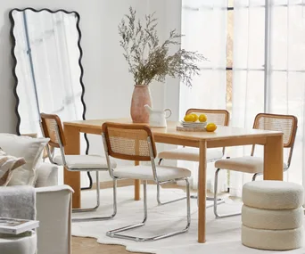 Temple and Webster Cesca replica dining chairs around a timber dining table