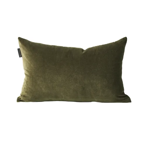 A velvet green cushion