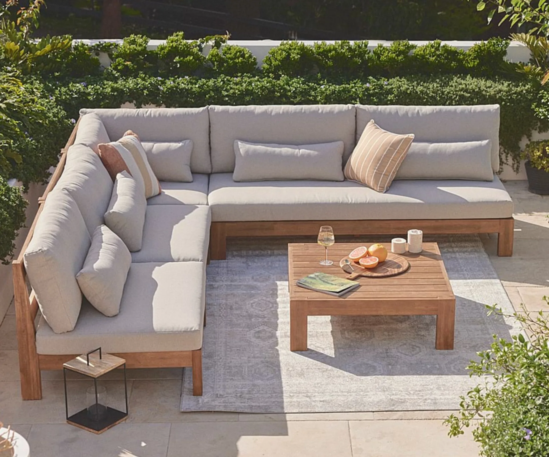 A grey and timber outdoor lounge set