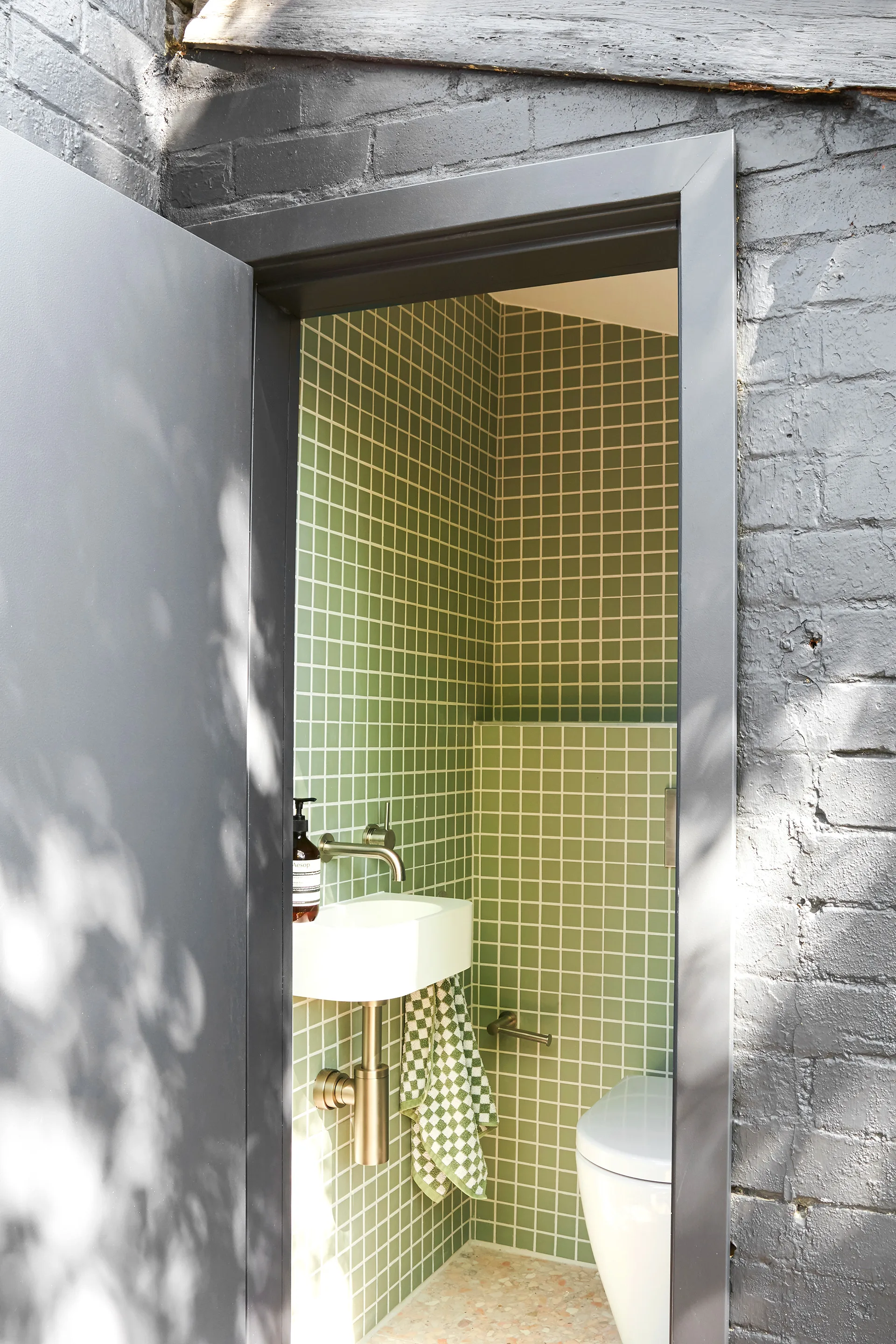 green-outhouse-bathroom