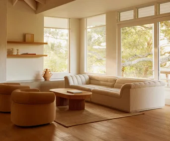 A neutral-toned living room with a beige lounge