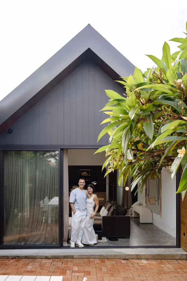 steph and gian at the back door of their sydney home
