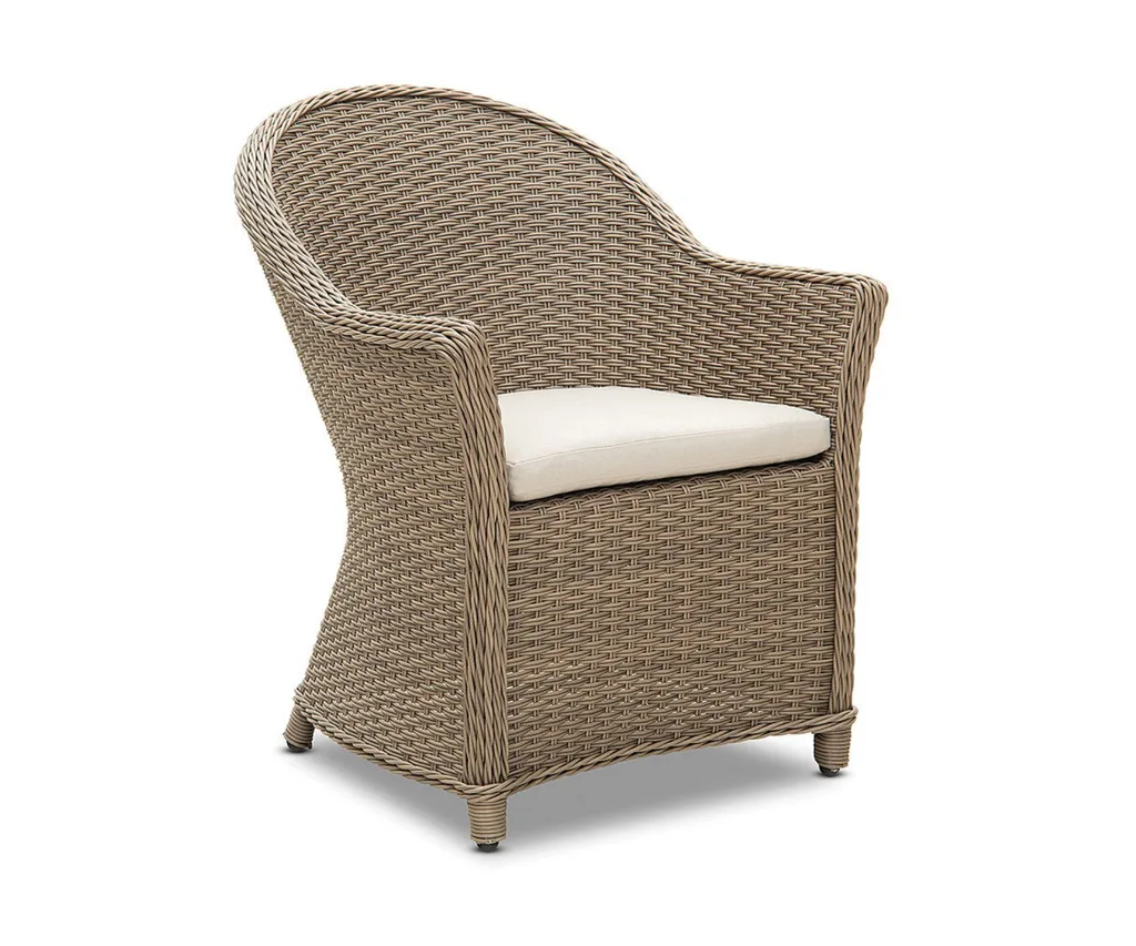 Wicker outdoor chair with cream cushion