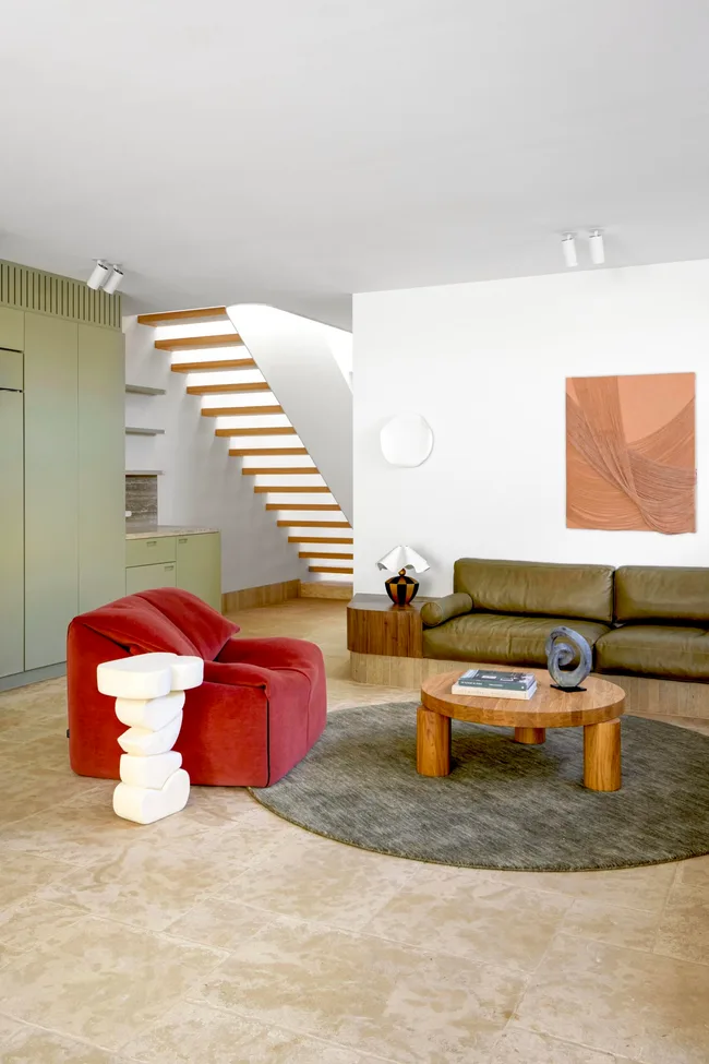 A living area with pops of green