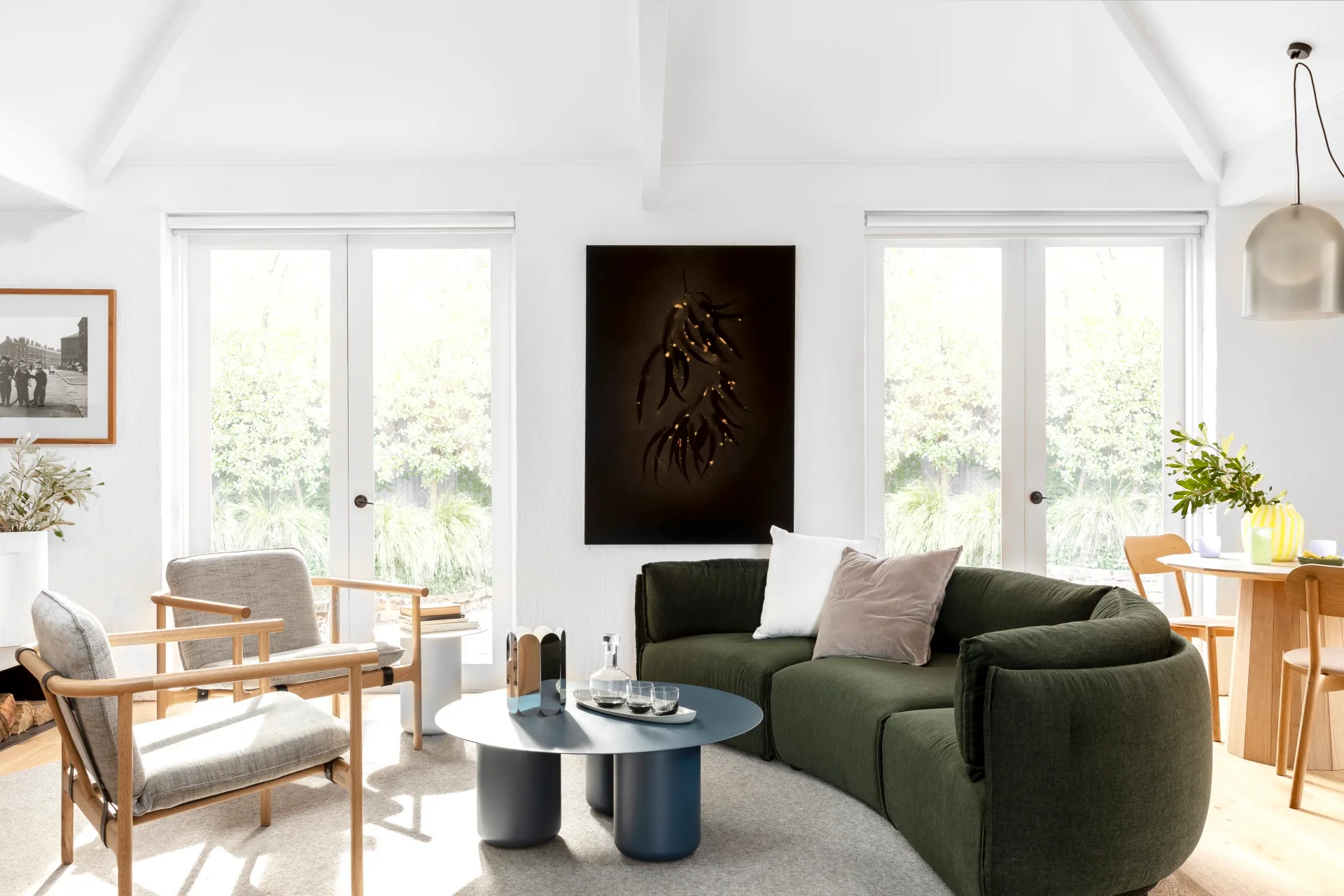 open-plan-living-green-curved-couch