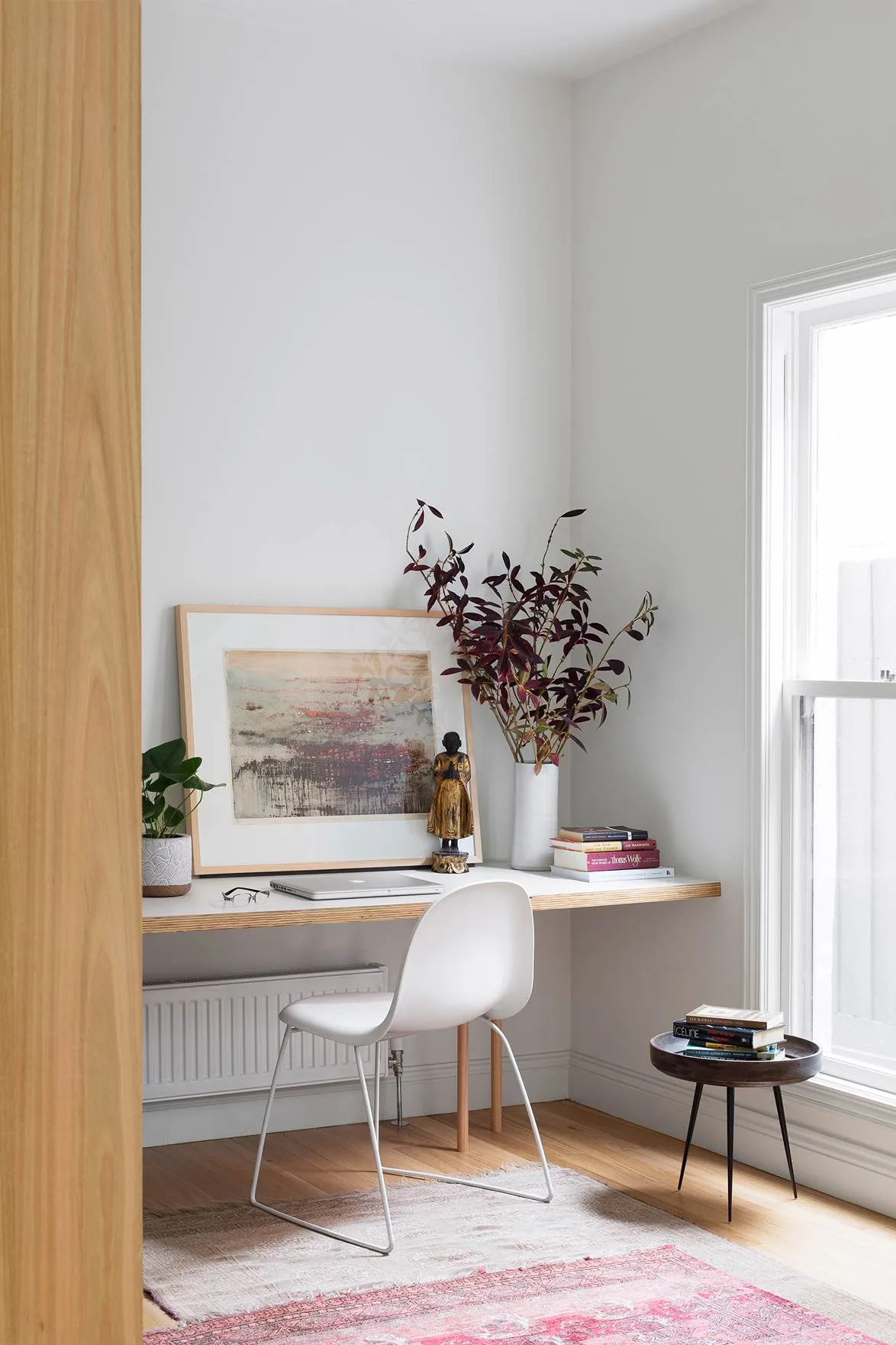 Natural light pours into this chic study